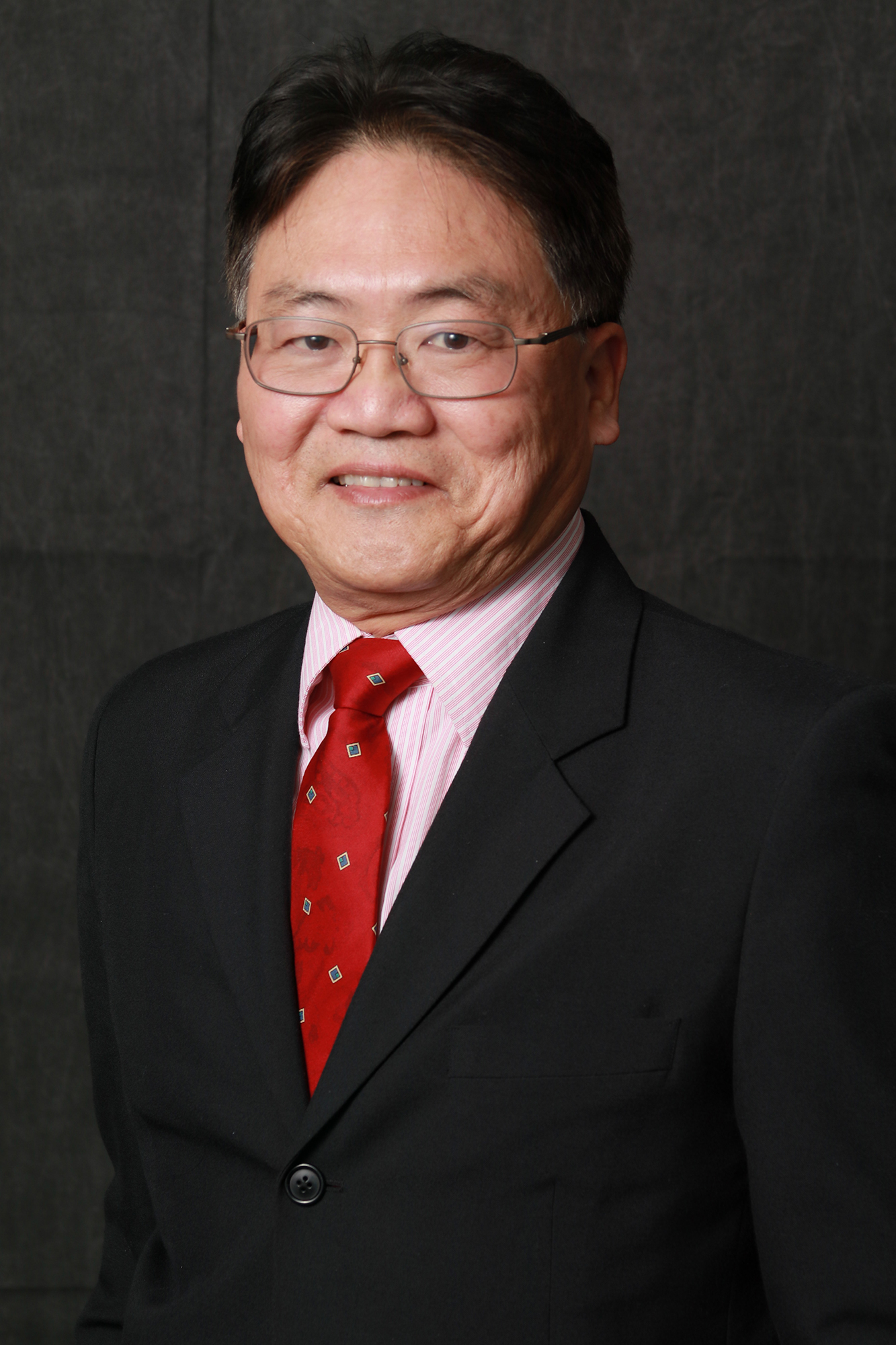 Andrew S. Tan